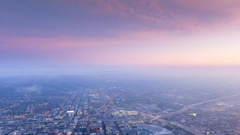 Aerial cityscape at sunset — Stillmotion