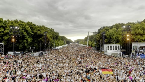 Outdoor stage event crowd watch screen — Stillmotion