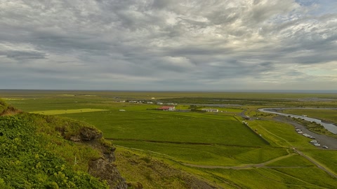 Green cliffs and waterfall valley — Stillmotion