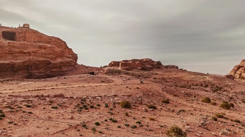 Desert butte and carved rock temple — Stillmotion