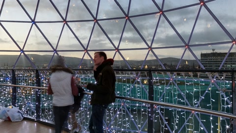 Interior viewing deck with city lights — Stillmotion