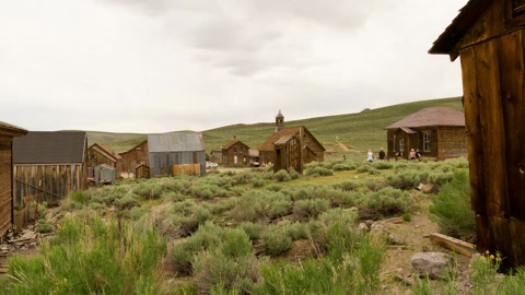 Old wooden sheds in ghost town — Stillmotion