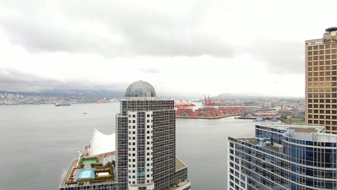 City skyline with waterfront skyscrapers — Stillmotion