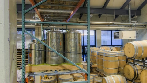 Industrial storage room with barrels and tanks — Stillmotion