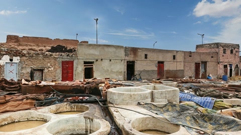 Derelict urban slum with water cisterns — Stillmotion