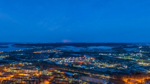 Aerial city lights at night — Stillmotion