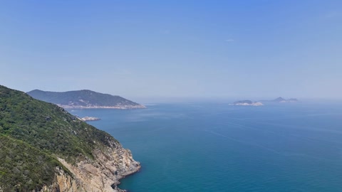 Coastal cliffs and rocky islet — Stillmotion