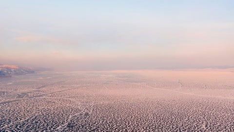 Snowy desert at sunset in fog — Stillmotion