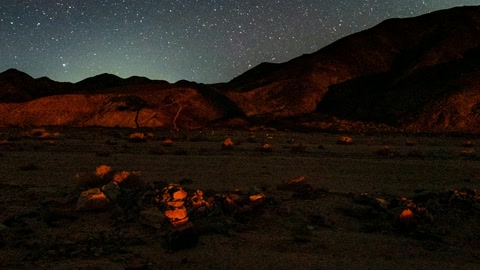 Starry night over volcanic mountains — Stillmotion
