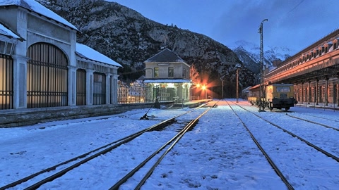 Snowy railway yard in mountains — Stillmotion