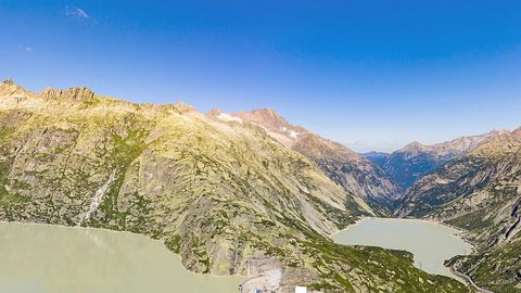 Mountain path through alpine lakes — Stillmotion