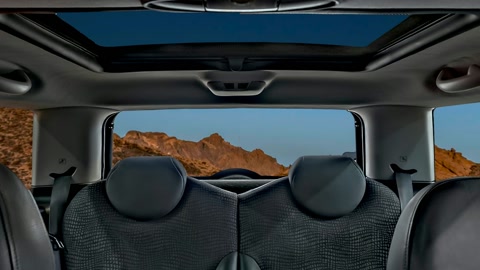 Car interior with mountain road view — Stillmotion