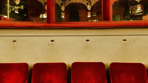 Ornate red-seat auditorium interior — Stillmotion