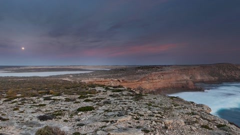Cliff above the sea at sunset — Stillmotion