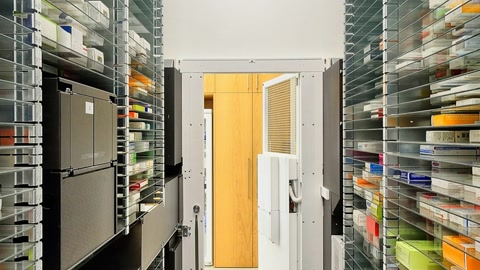Hardware store aisle with shelving units — Stillmotion