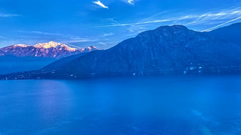 Lakeside village at sunset — Stillmotion
