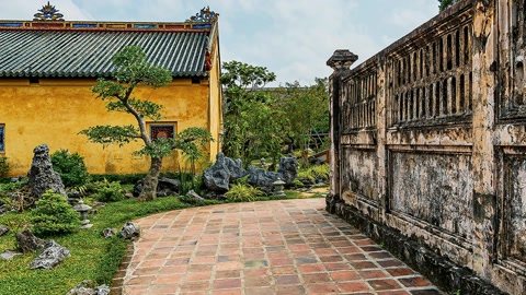 Traditional courtyard with garden pathways — Stillmotion
