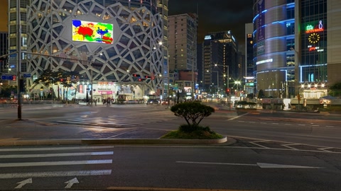 Downtown city streets at night — Stillmotion