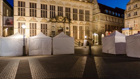 Night plaza with market tents — Stillmotion