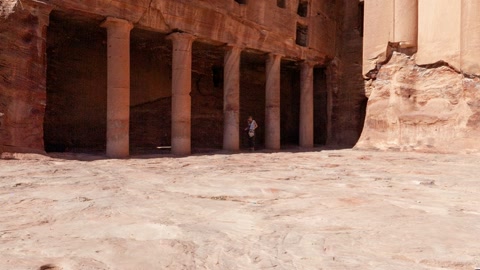 Rock-cut kasbah in desert canyon — Stillmotion