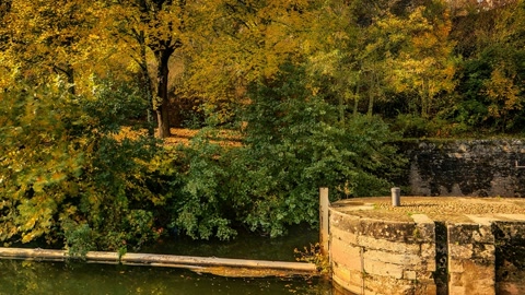Historic canal under stone arches — Stillmotion