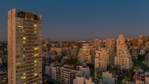 City skyline with skyscrapers at sunset — Stillmotion