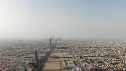 Aerial cityscape with modern tower frame — Stillmotion