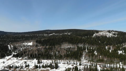 Snow-covered open-pit mine landscape — Stillmotion