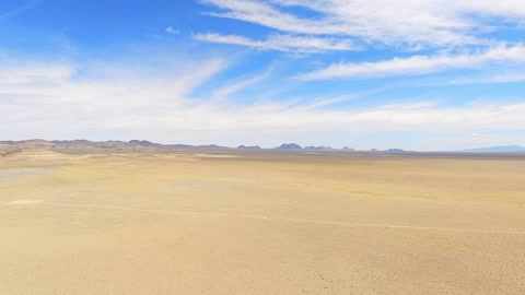Open desert with solar array — Stillmotion