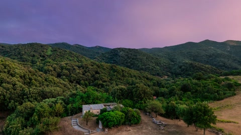 Mountain path under cloudy sunset sky — Stillmotion