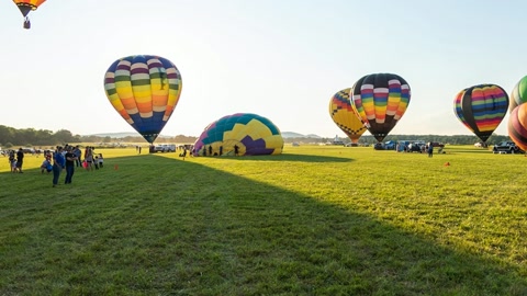 Hot air balloons on airfield — Stillmotion