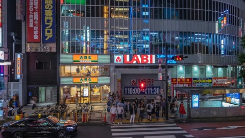 Night city crosswalk with taxis — Stillmotion