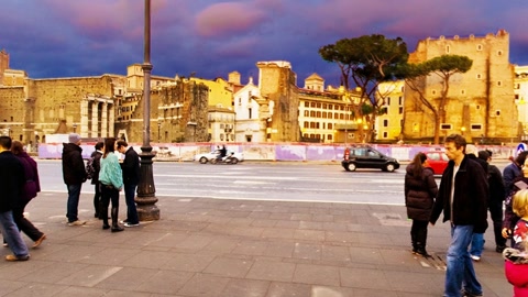 Crowded promenade overlooking ancient ruins — Stillmotion