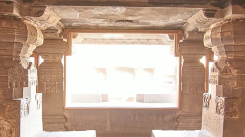 Carved stone burial chamber interior — Stillmotion