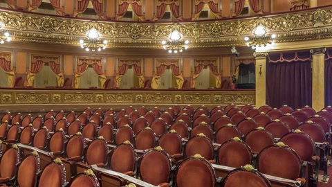 Ornate theater auditorium with rows of seats — Stillmotion