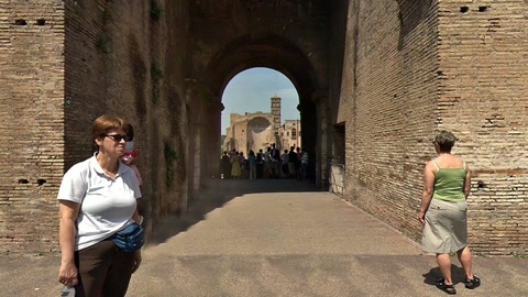 Ancient amphitheater interior with visitors — Stillmotion