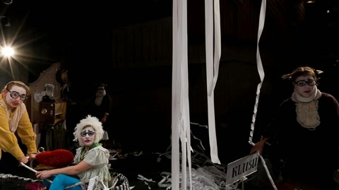 Stage performers with hanging streamers — Stillmotion