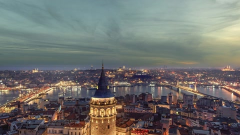 City skyline over waterfront at dusk — Stillmotion