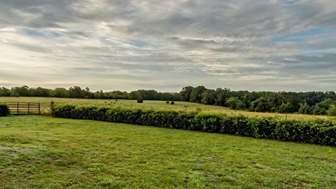 Rural memorial under cloudy skies — Stillmotion