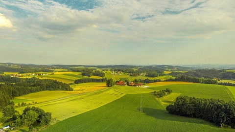 Cultivated fields under open sky — Stillmotion