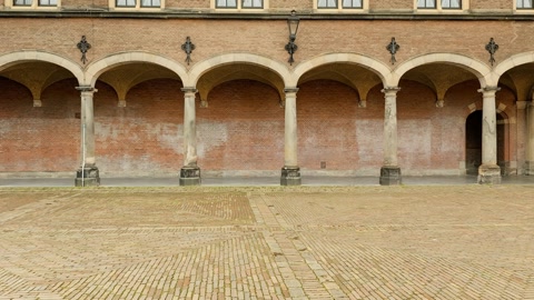 Historic courtyard with benches and arcades — Stillmotion