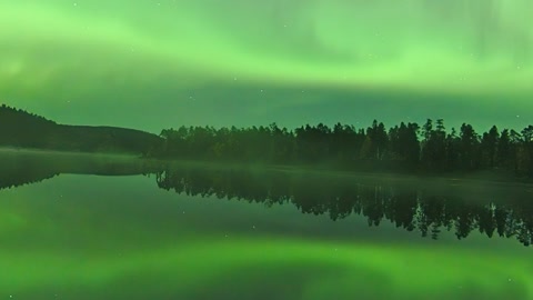 Aurora reflected over lake — Stillmotion