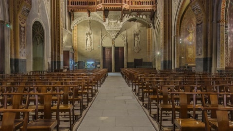 Gothic church interior with pews — Stillmotion