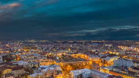 Illuminated city at night — Stillmotion