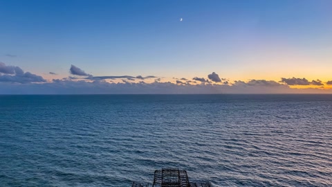 Coastal city shoreline at dusk — Stillmotion