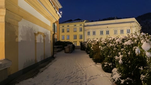 Snowy night city square architecture — Stillmotion