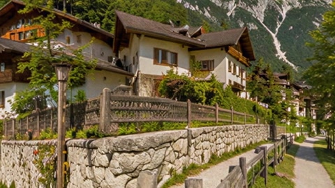 Alpine lakeside chalet village — Stillmotion