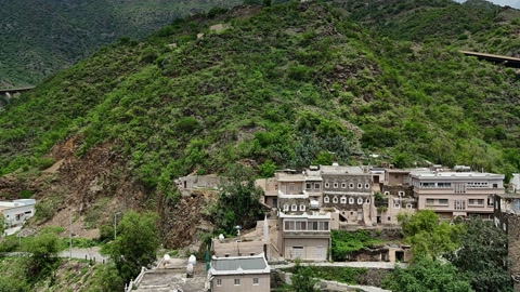 Mountain village among green hills — Stillmotion