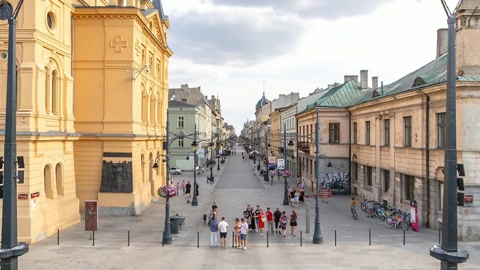 Urban plaza with park and historic buildings — Stillmotion