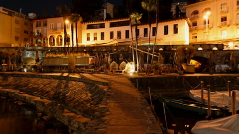 Night canal with moored boats — Stillmotion